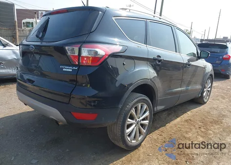 2017 Ford Escape Titanium z USA, uszkodzony, nr VIN 1FMCU0JD6HUE23085